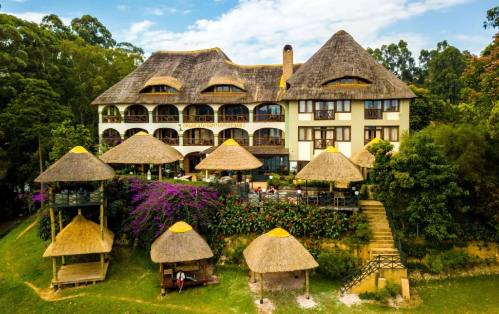 Lakeside view of BirdNest Resort Bunyonyi with terraced hills in the background
