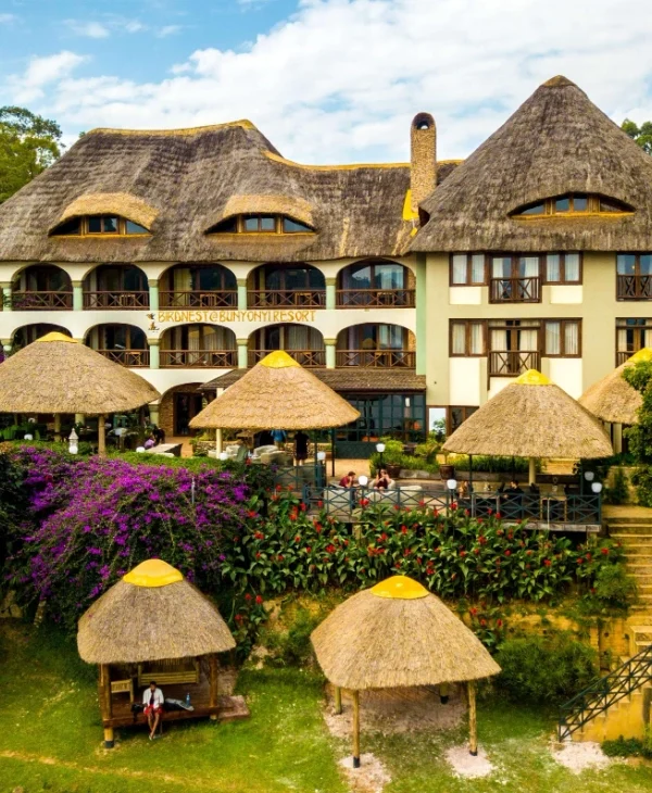 Lakeside view of BirdNest Resort Bunyonyi with terraced hills in the background