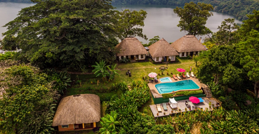 A scenic shot of Ndali Lodge, emphasizing its beautiful setting within the Kibale region.